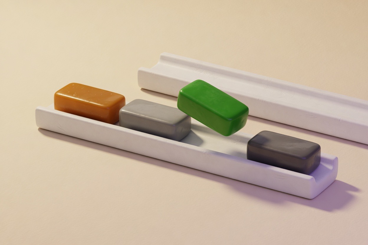 Illustration: four coloured marker blocks resting in a white rail, one lifted mid-air as it is repositioned, with a second empty rail behind.